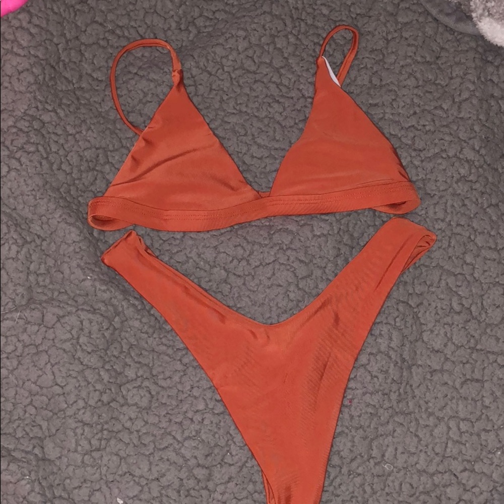 Woman’s cheeky small bathing suit